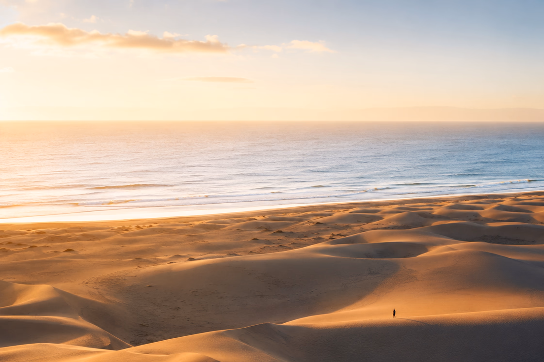 The dunes of Maspalomas facing the sea in southern Gran Canaria at sunset. A refuge of sand for you and your gigolo.