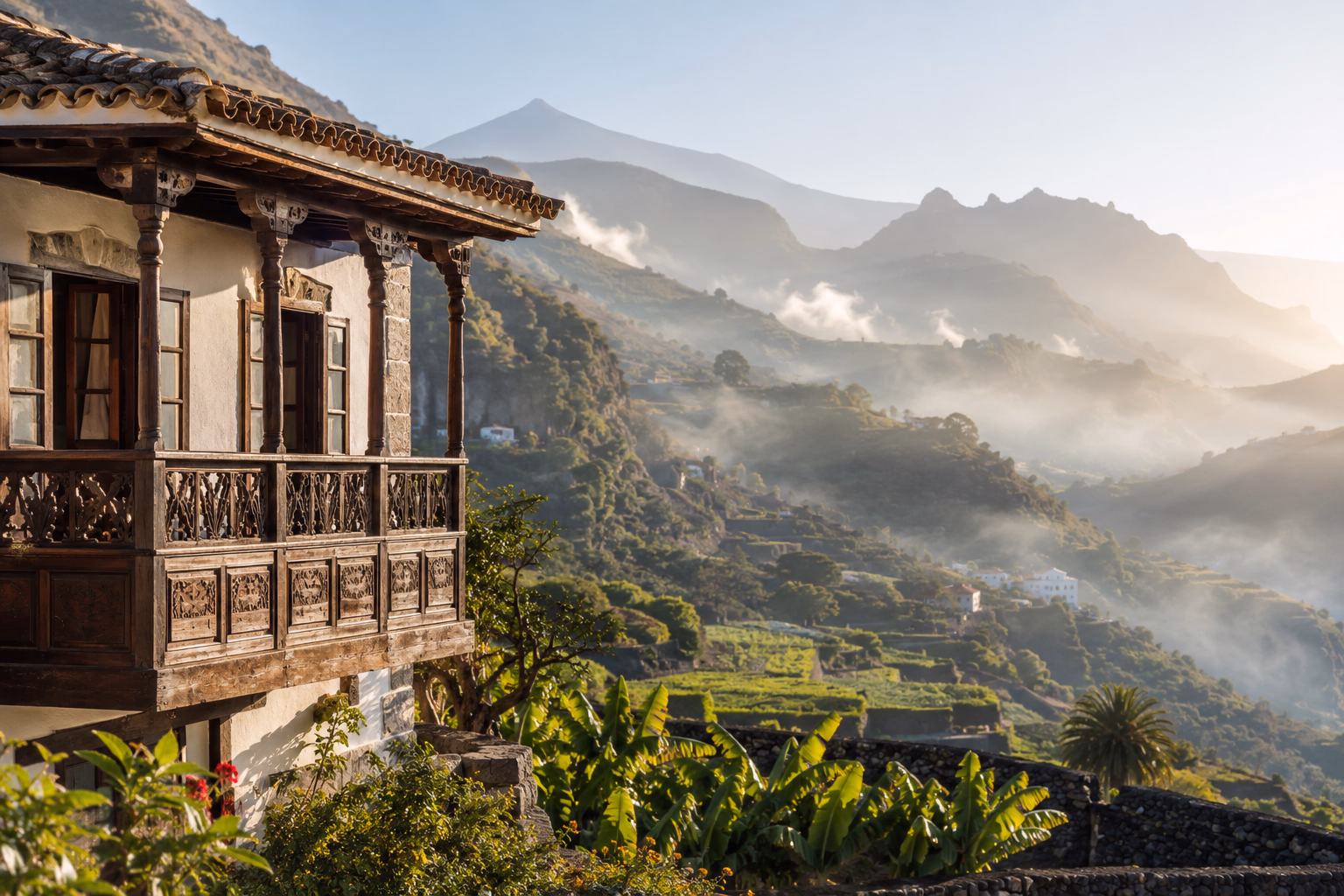 From a Canarian balcony, the green valley of northern Tenerife and Mount Teide through the mist, the perfect setting in which to lose yourself with your gigolo.