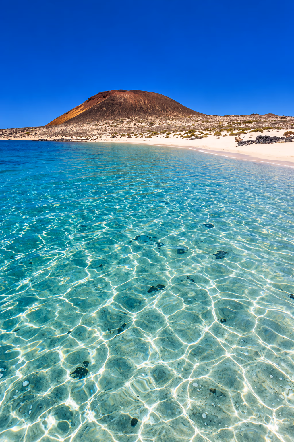 Das türkisfarbene, klare Wasser der Playa Francesa auf La Graciosa